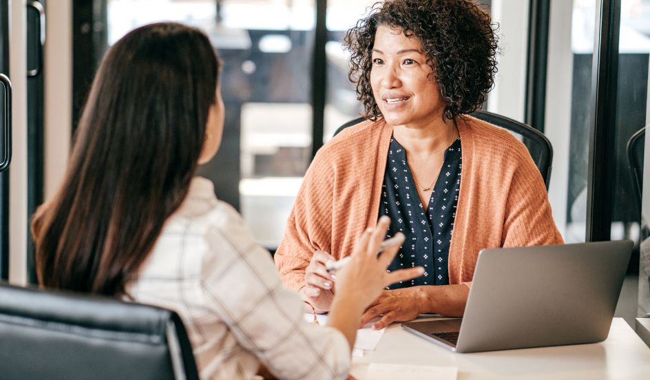 community service worker talking with client