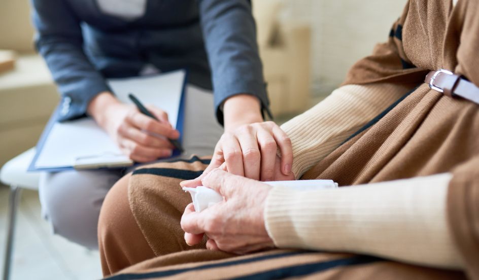 community service worker showing compassion to client