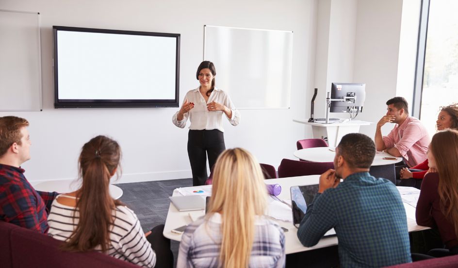 students listening to instructor during lecture