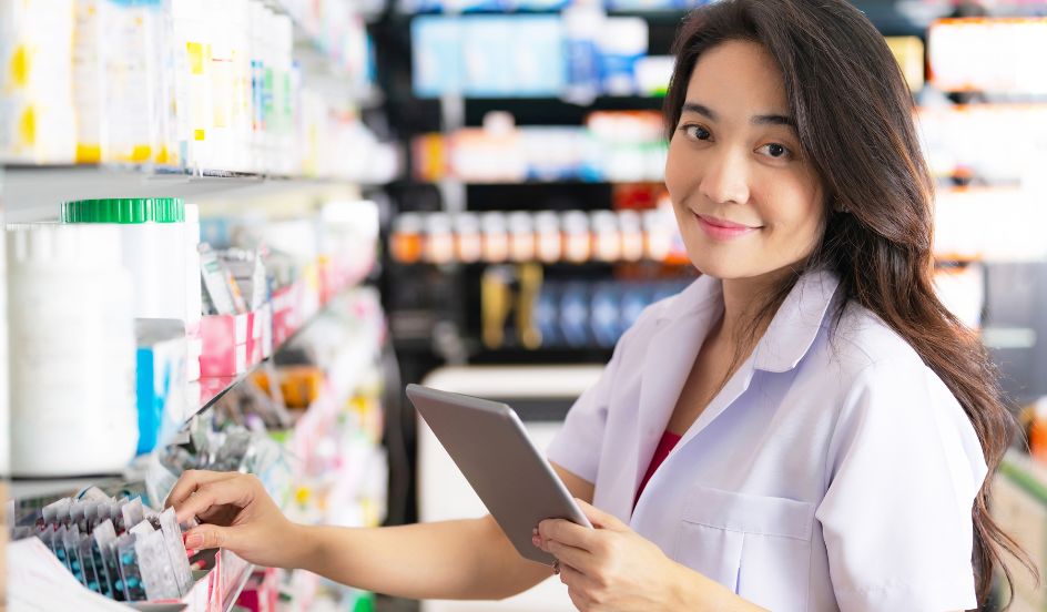 pharmacist assistant looking at medications