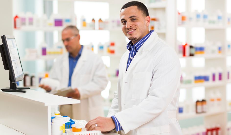 pharmacist working at counter