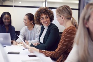 Business administration professionals collaborating in a meeting