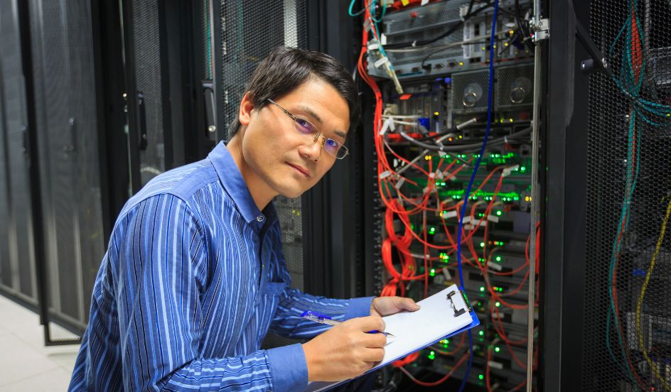 IT Administrator working on network systems
