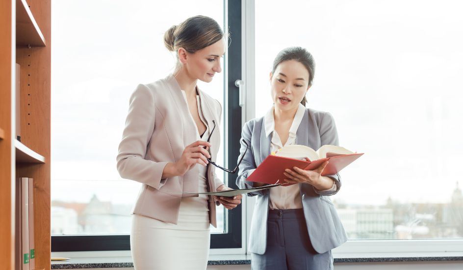 legal assistant speaking with a lawyer