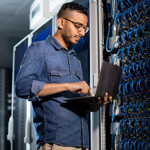 A network administrator checking hardware