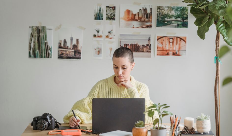 a woman designing using her laptop