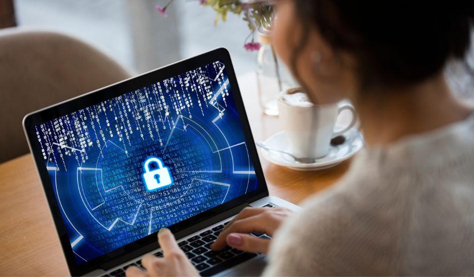 a woman typing on a tablet with a lock displayed on the screen