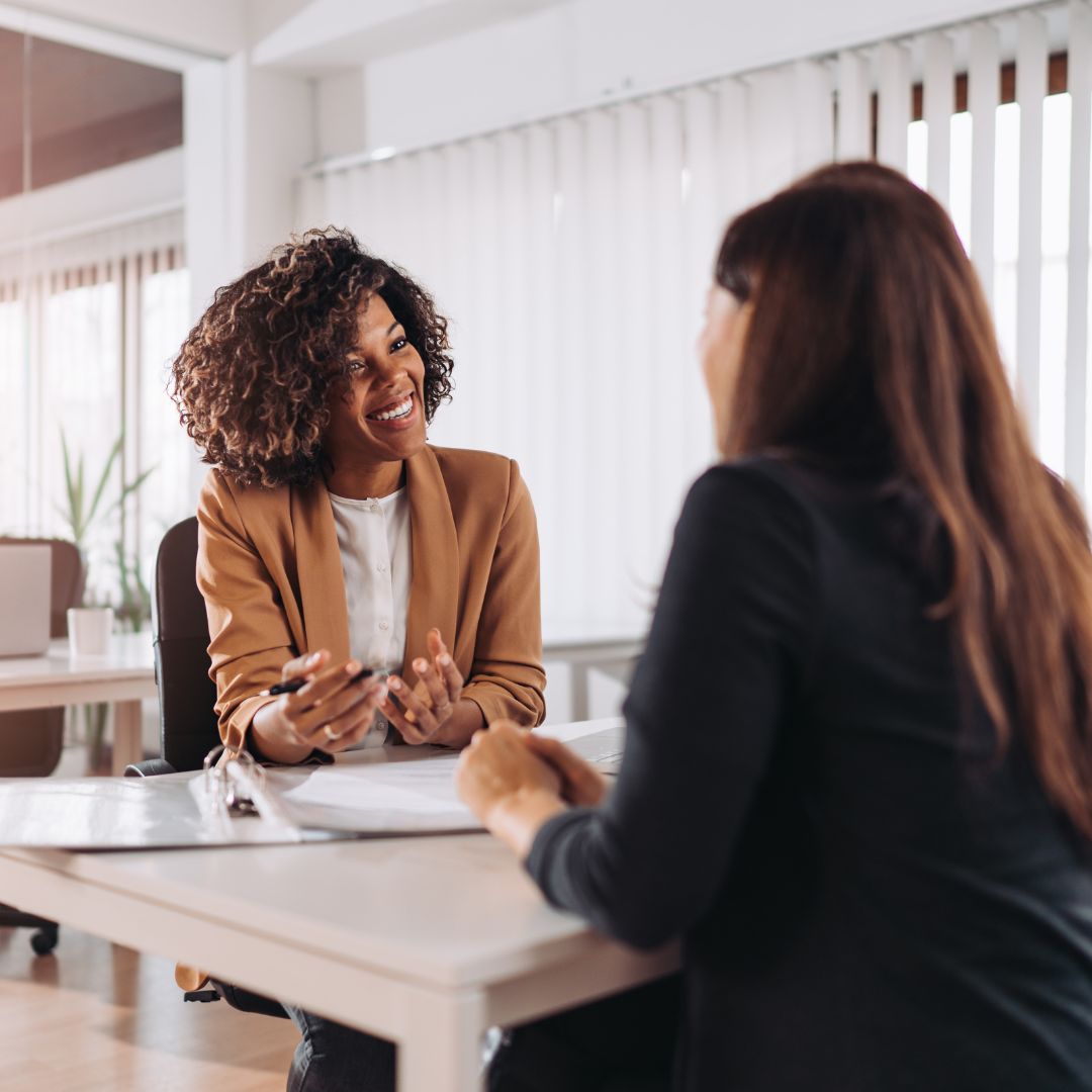 woman consulting a Financial Aid Officer